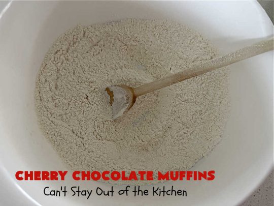 Cherry Chocolate Muffins | Can't Stay Out of the Kitchen | Every sweet tooth craving will be satisfied by one bite of these sensational #muffins. They're filled with #CandiedCherries & miniature #ChocolateChips. #Bananas & #applesauce keep the muffins moist. They're perfect for any #brunch or #breakfast #menu, as snacks to take to sports practices, for #tailgating parties or #potlucks. Everyone will want seconds. #chocolate #cherries #holiday #CherryMuffins #HolidayBreakfast #ChocolateMuffins #CherryChocolateMuffins