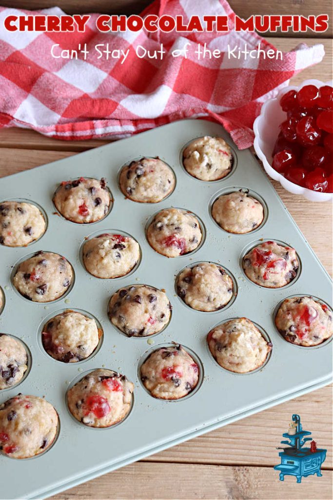 Cherry Chocolate Muffins | Can't Stay Out of the Kitchen | Every sweet tooth craving will be satisfied by one bite of these sensational #muffins. They're filled with #CandiedCherries & miniature #ChocolateChips. #Bananas & #applesauce keep the muffins moist. They're perfect for any #brunch or #breakfast #menu, as snacks to take to sports practices, for #tailgating parties or #potlucks. Everyone will want seconds. #chocolate #cherries #holiday #CherryMuffins #HolidayBreakfast #ChocolateMuffins #CherryChocolateMuffins