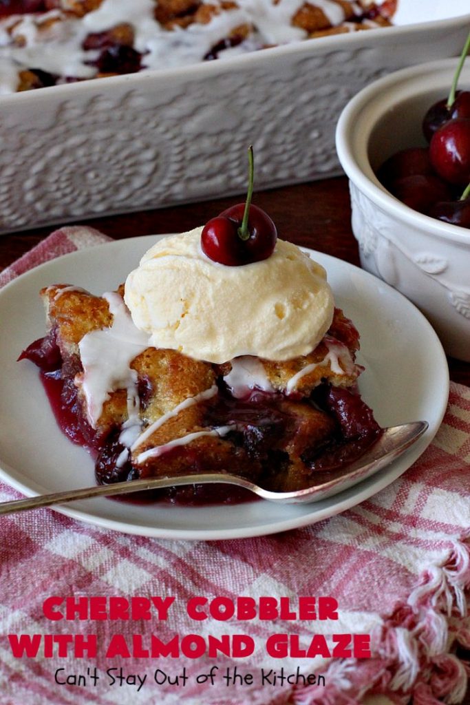 Cherry Cobbler with Almond Glaze | Can't Stay Out of the Kitchen | This lovely #dessert is actually assembled in layers that you don't stir together. It's terrific for #summer #holidays, backyard BBQs & potlucks while #FreshCherries are still in season. #cherries #CherryCobbler #cobbler #CherryDessert #CherryCobblerWithAlmondGlaze #Canbassador #NWCherries #NorthWestCherryGrowers #FavoriteCherryCobbler