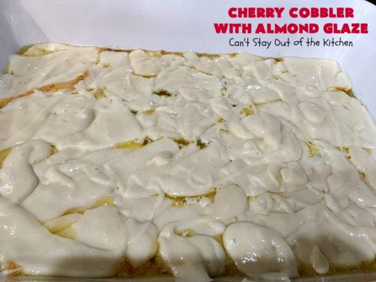 Cherry Cobbler with Almond Glaze | Can't Stay Out of the Kitchen | This lovely #dessert is actually assembled in layers that you don't stir together. It's terrific for #summer #holidays, backyard BBQs & potlucks while #FreshCherries are still in season. #cherries #CherryCobbler #cobbler #CherryDessert #CherryCobblerWithAlmondGlaze #Canbassador #NWCherries #NorthWestCherryGrowers #FavoriteCherryCobbler