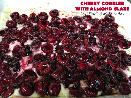 Cherry Cobbler with Almond Glaze | Can't Stay Out of the Kitchen | This lovely #dessert is actually assembled in layers that you don't stir together. It's terrific for #summer #holidays, backyard BBQs & potlucks while #FreshCherries are still in season. #cherries #CherryCobbler #cobbler #CherryDessert #CherryCobblerWithAlmondGlaze #Canbassador #NWCherries #NorthWestCherryGrowers #FavoriteCherryCobbler
