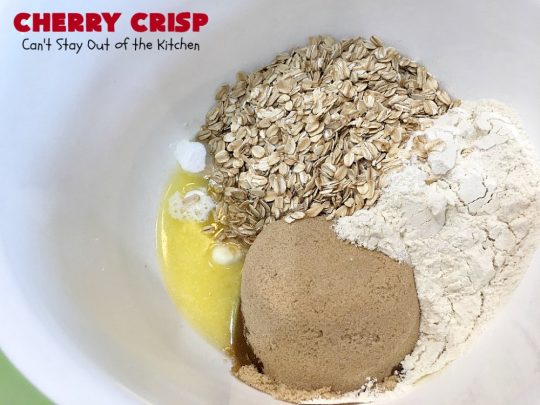 Cherry Crisp | Can't Stay Out of the Kitchen | this fantastic #recipe is the perfect #dessert now that #FreshCherries are in season. It's flavored with #AlmondExtract & has a delightful #Oatmeal topping. Terrific for potlucks, backyard barbecues & summer #holiday fun like #FourthOfJuly. #cherries #CherryCrisp #CherryDessert #HolidayDessert #NorthwestCherries #NorthwestCherryGrowers #NWCherries #Canbassador #NWCherryGrowers