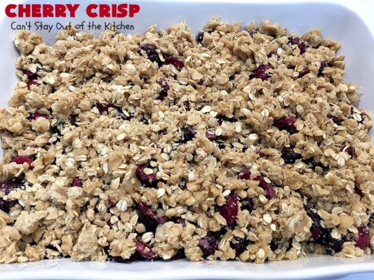 Cherry Crisp | Can't Stay Out of the Kitchen | this fantastic #recipe is the perfect #dessert now that #FreshCherries are in season. It's flavored with #AlmondExtract & has a delightful #Oatmeal topping. Terrific for potlucks, backyard barbecues & summer #holiday fun like #FourthOfJuly. #cherries #CherryCrisp #CherryDessert #HolidayDessert #NorthwestCherries #NorthwestCherryGrowers #NWCherries #Canbassador #NWCherryGrowers