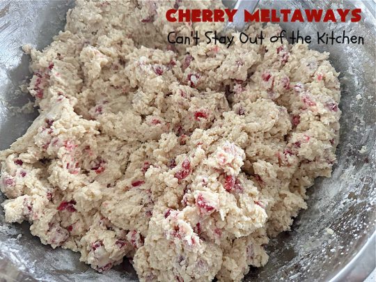 Cherry Meltaways | Can't Stay Out of the Kitchen | #CherryMeltaways are so irresistible & mouthwatering. These festive & beautiful #cookies seem to just melt in the mouth! This #dessert includes #CandiedCherries & #almond extract to bump up the flavors. Perfect for #holiday & #Christmas parties since each batch makes about 5 1/2 dozen. #CherryDessert #HolidayDessert #cherries #ChristmasCookieExchange