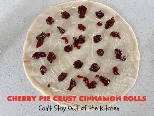 Cherry Pie Crust Cinnamon Rolls | Can't Stay Out of the Kitchen | You'll be swooning over every bite of these luscious #PieCrustCinnamonRolls. These include #CherryPreserves so they are doubly delicious. Great sweet treat for #breakfast or #brunch menus. This quick & easy #5IngredientRecipe can be whipped up in a jiffy so these #CinnamonRolls can be enjoyed all day long! #cherries #CherryPieCrustCinnamonRolls