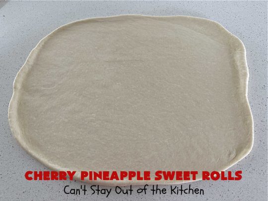 Cherry Pineapple Sweet Rolls | Can't Stay Out of the Kitchen | Prepare to drool over these luscious #SweetRolls. They're filled with a scrumptious #CherryPineappleFruitMix & glazed with a thick #almond icing that makes these #CinnamonRolls so rich and decadent you won't be able to resist them. Wonderful for #holidays or for a weekend or company #breakfast or #brunch. #cherry #pineapple #ParadiseFruit #CherryPineappleSweetRolls