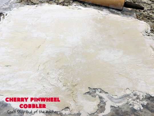 Cherry Pinwheel Cobbler | Can't Stay Out of the Kitchen | this awesome #dessert rolls up #almond flavored #cherries in #PieCrust. A syrup is poured over top before baking. Terrific #CherryDessert while #FreshCherries are in season. #cobbler #CherryCobbler #CherryPinwheelCobbler #Summer #SummerDessert #NorthwestCherryGrowers #NWCherries #Canbassador