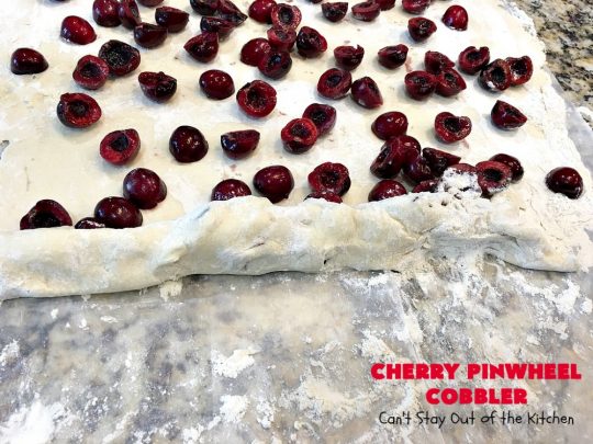 Cherry Pinwheel Cobbler | Can't Stay Out of the Kitchen | this awesome #dessert rolls up #almond flavored #cherries in #PieCrust. A syrup is poured over top before baking. Terrific #CherryDessert while #FreshCherries are in season. #cobbler #CherryCobbler #CherryPinwheelCobbler #Summer #SummerDessert #NorthwestCherryGrowers #NWCherries #Canbassador