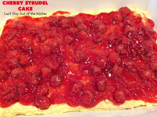 Cherry Strudel Cake | Can't Stay Out of the Kitchen | this rich, decadent #cake is absolutely divine! It's perfect for either a #holiday #breakfast or for #dessert. It uses #CherryPieFilling in the middle, a streusel topping & icing with #almond extract. Tastes like eating #CherryStrudel but so much easier! #coffeecake #CherryCoffeecake #CherryCake #Brunch #HolidayBreakfast #CherryDessert #CherryStrudelCake