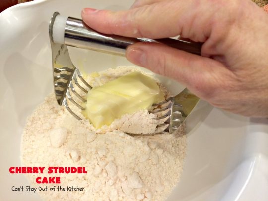 Cherry Strudel Cake | Can't Stay Out of the Kitchen | this rich, decadent #cake is absolutely divine! It's perfect for either a #holiday #breakfast or for #dessert. It uses #CherryPieFilling in the middle, a streusel topping & icing with #almond extract. Tastes like eating #CherryStrudel but so much easier! #coffeecake #CherryCoffeecake #CherryCake #Brunch #HolidayBreakfast #CherryDessert #CherryStrudelCake