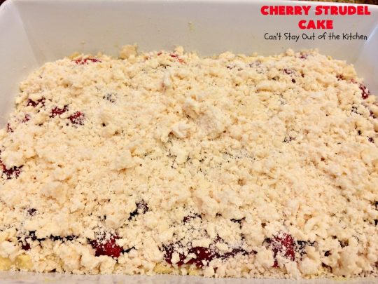 Cherry Strudel Cake | Can't Stay Out of the Kitchen | this rich, decadent #cake is absolutely divine! It's perfect for either a #holiday #breakfast or for #dessert. It uses #CherryPieFilling in the middle, a streusel topping & icing with #almond extract. Tastes like eating #CherryStrudel but so much easier! #coffeecake #CherryCoffeecake #CherryCake #Brunch #HolidayBreakfast #CherryDessert #CherryStrudelCake