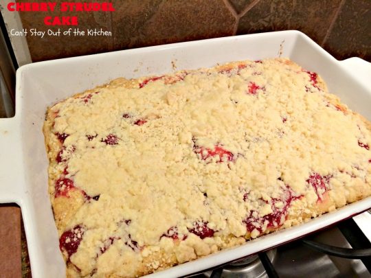 Cherry Strudel Cake | Can't Stay Out of the Kitchen | this rich, decadent #cake is absolutely divine! It's perfect for either a #holiday #breakfast or for #dessert. It uses #CherryPieFilling in the middle, a streusel topping & icing with #almond extract. Tastes like eating #CherryStrudel but so much easier! #coffeecake #CherryCoffeecake #CherryCake #Brunch #HolidayBreakfast #CherryDessert #CherryStrudelCake