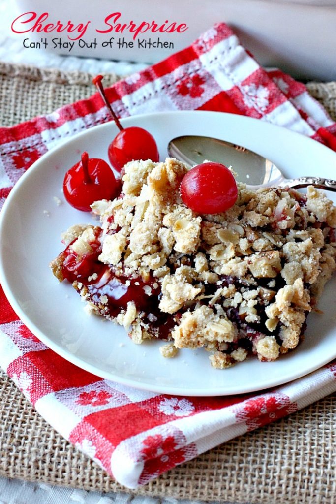 Cherry Surprise | Can't Stay Out of the Kitchen | this fabulous #dessert is made with #cherrypiefilling #coconut and #pecans in a lovely #oatmeal crust. This makes a great #cobbler for #holidays and #Valentine'sDay. 