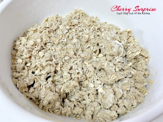 Cherry Surprise | Can't Stay Out of the Kitchen | this fabulous #dessert is made with #cherrypiefilling #coconut and #pecans in a lovely #oatmeal crust. This makes a great #cobbler for #holidays and #Valentine'sDay. 