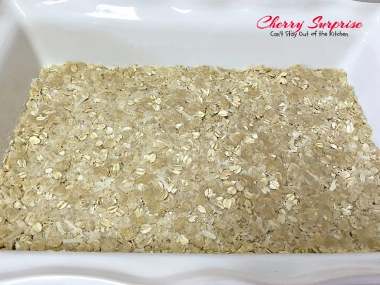 Cherry Surprise | Can't Stay Out of the Kitchen | this fabulous #dessert is made with #cherrypiefilling #coconut and #pecans in a lovely #oatmeal crust. This makes a great #cobbler for #holidays and #Valentine'sDay. 