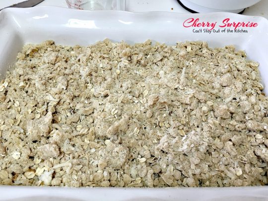 Cherry Surprise | Can't Stay Out of the Kitchen | this fabulous #dessert is made with #cherrypiefilling #coconut and #pecans in a lovely #oatmeal crust. This makes a great #cobbler for #holidays and #Valentine'sDay. 