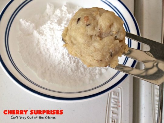 Cherry Surprises | Can't Stay Out of the Kitchen | these melt-in-your-mouth #cookies are absolutely spectacular. #CandiedCherries are hidden inside each #cookie before #baking. Then they're rolled in powdered sugar to serve. These heavenly cookies have been on our #ChristmasCookie baking list for decades! #dessert #Christmas #ChristmasDessert #cherry #CherryDessert #ChristmasCookieExchange