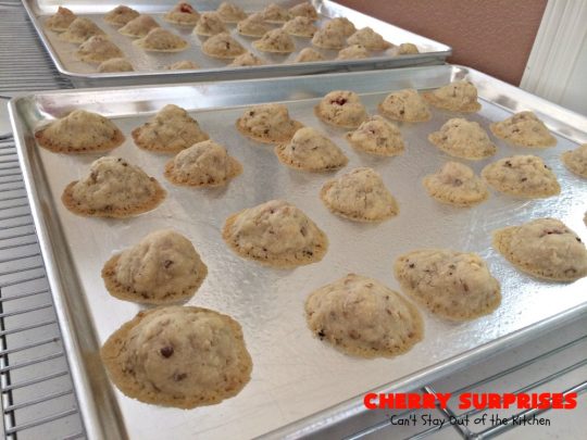 Cherry Surprises | Can't Stay Out of the Kitchen | these melt-in-your-mouth #cookies are absolutely spectacular. #CandiedCherries are hidden inside each #cookie before #baking. Then they're rolled in powdered sugar to serve. These heavenly cookies have been on our #ChristmasCookie baking list for decades! #dessert #Christmas #ChristmasDessert #cherry #CherryDessert #ChristmasCookieExchange