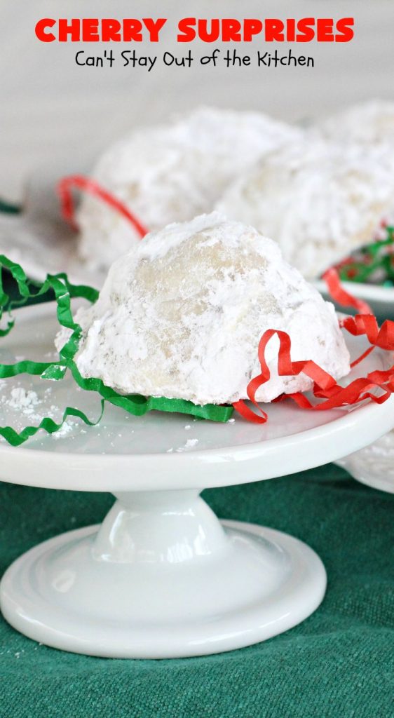 Cherry Surprises | Can't Stay Out of the Kitchen | these melt-in-your-mouth #cookies are absolutely spectacular. #CandiedCherries are hidden inside each #cookie before #baking. Then they're rolled in powdered sugar to serve. These heavenly cookies have been on our #ChristmasCookie baking list for decades! #dessert #Christmas #ChristmasDessert #cherry #CherryDessert #ChristmasCookieExchange