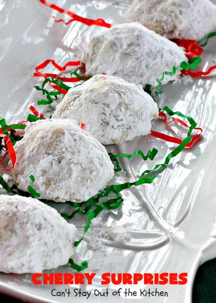 Cherry Surprises | Can't Stay Out of the Kitchen | these melt-in-your-mouth #cookies are absolutely spectacular. #CandiedCherries are hidden inside each #cookie before #baking. Then they're rolled in powdered sugar to serve. These heavenly cookies have been on our #ChristmasCookie baking list for decades! #dessert #Christmas #ChristmasDessert #cherry #CherryDessert #ChristmasCookieExchange