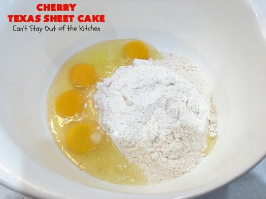 Cherry Texas Sheet Cake | Can't Stay Out of the Kitchen | this luscious #cake will knock your socks off! This mouthwatering #recipe will feed a crowd so it's great for #holidays or company. The #CreamCheese icing is wonderful. #dessert #HolidayDessert #CherryDessert #TexasSheetCake #CherryTexasSheetCake