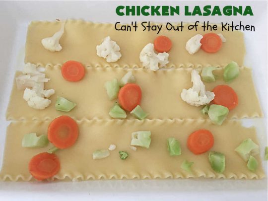 Chicken Lasagna | Can't Stay Out of the Kitchen | this extra cheesy #lasagna #recipe includes #chicken & a mixed #vegetable blend of #broccoli, #cauliflower & #carrots. The #cheese sauce includes #CreamOfChickenSoup! It's delightful for company dinners as everyone is sure to want seconds. #casserole #noodles #pasta #ChickenLasagna