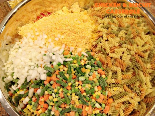 Chicken and Biscuit Casserole | Can't Stay Out of the Kitchen | our favorite #chicken #casserole recipe. This one includes #noodles, #biscuits, veggies & lots of #cheese!