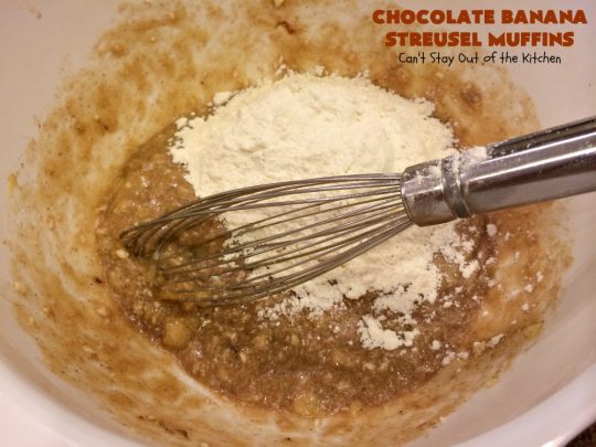 Chocolate Banana Streusel Muffins | Can't Stay Out of the Kitchen | these delicious #muffins are irresistible. They're filled with #bananas & topped with a streusel made from miniature #ChocolateChips & brown sugar. Once the muffins bake, the top turns to #toffee! So mouthwatering. #breakfast #chocolate #HolidayBreakfast #Easter #MothersDay #EasterBreakfast #MothersDayBreakfast #ChocolateMuffins #BananaMuffins #ToffeeMuffins