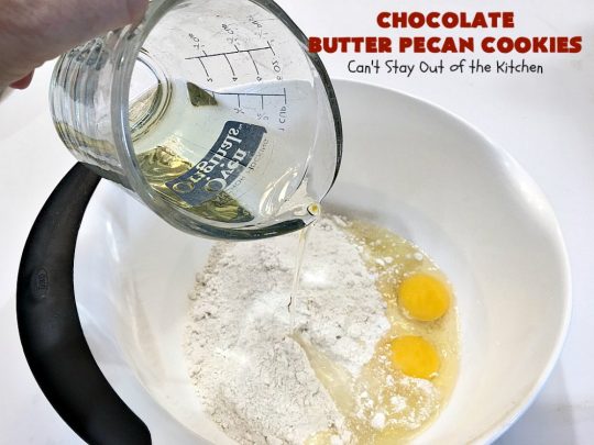 Chocolate Butter Pecan Cookies | Can't Stay Out of the Kitchen | these 5-ingredient #cookies are absolutely irresistible! They're made with #pecans, #ButterPecan #CakeMix & loads of #ChocolateChips. Every bite is rich, decadent & heavenly. #tailgating #dessert #ButterPecanDessert #ChocolateDessert #chocolate #ChristmasCookieExchange #ChocolateButterPecanCookies #baking #ChocolateChipCookies #Holiday #HolidayBaking