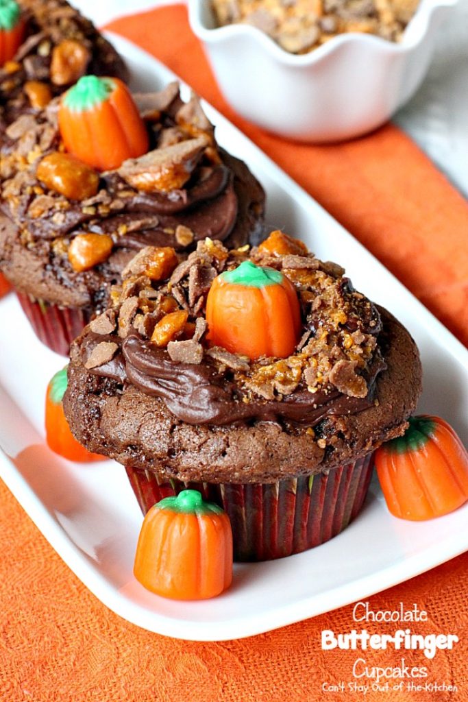 Chocolate Butterfinger Cupcakes | Can't Stay Out of the Kitchen | these fantastic #chocolate #cupcakes are filled with #ButterfingerBites and spread with #Hershey's dark roast chocolate frosting then they're sprinkled with more #butterfinger deliciousness on top! #dessert