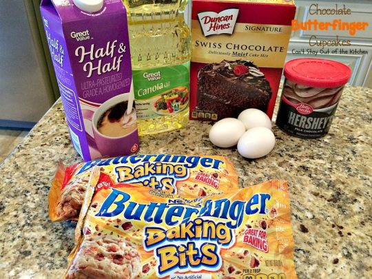 Chocolate Butterfinger Cupcakes | Can't Stay Out of the Kitchen | these fantastic #chocolate #cupcakes are filled with #ButterfingerBites and spread with #Hershey's dark roast chocolate frosting then they're sprinkled with more #butterfinger deliciousness on top! #dessert