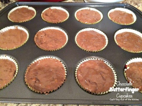 Chocolate Butterfinger Cupcakes | Can't Stay Out of the Kitchen | these fantastic #chocolate #cupcakes are filled with #ButterfingerBites and spread with #Hershey's dark roast chocolate frosting then they're sprinkled with more #butterfinger deliciousness on top! #dessert