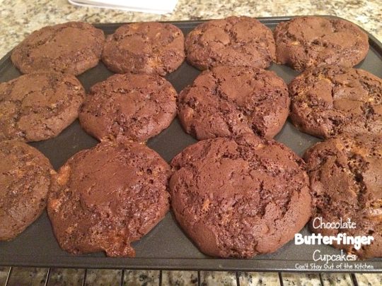 Chocolate Butterfinger Cupcakes | Can't Stay Out of the Kitchen | these fantastic #chocolate #cupcakes are filled with #ButterfingerBites and spread with #Hershey's dark roast chocolate frosting then they're sprinkled with more #butterfinger deliciousness on top! #dessert