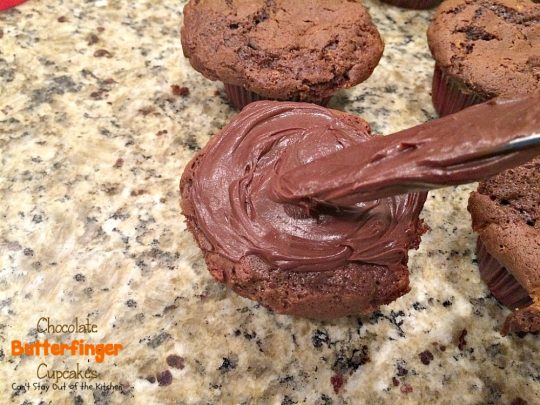 Chocolate Butterfinger Cupcakes | Can't Stay Out of the Kitchen | these fantastic #chocolate #cupcakes are filled with #ButterfingerBites and spread with #Hershey's dark roast chocolate frosting then they're sprinkled with more #butterfinger deliciousness on top! #dessert
