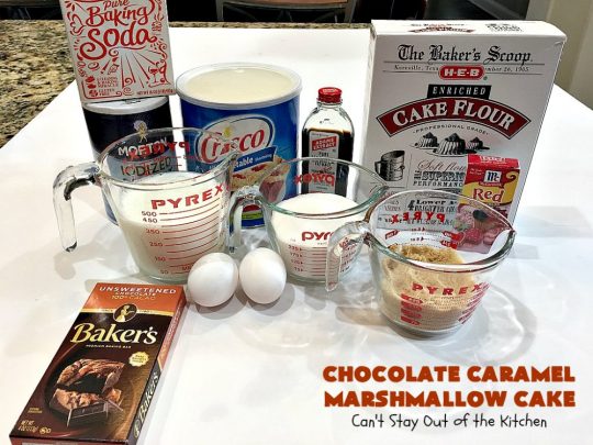 Chocolate Caramel Marshmallow Cake | this spectacular #chocolate #cake has a #caramel-like #praline filling & #marshmallow frosting. It's to die for! Terrific for company &  #holidays like #MothersDay or #FathersDay. #toffee #ChocolateCake #HolidayDessert #MothersDayDessert #FathersDayDessert #ChocolateCaramelMarshmallowCake #ChocolateDessert #CaramelDessert #ToffeeDessert #MarshmallowDessert