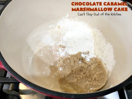 Chocolate Caramel Marshmallow Cake | this spectacular #chocolate #cake has a #caramel-like #praline filling & #marshmallow frosting. It's to die for! Terrific for company &  #holidays like #MothersDay or #FathersDay. #toffee #ChocolateCake #HolidayDessert #MothersDayDessert #FathersDayDessert #ChocolateCaramelMarshmallowCake #ChocolateDessert #CaramelDessert #ToffeeDessert #MarshmallowDessert
