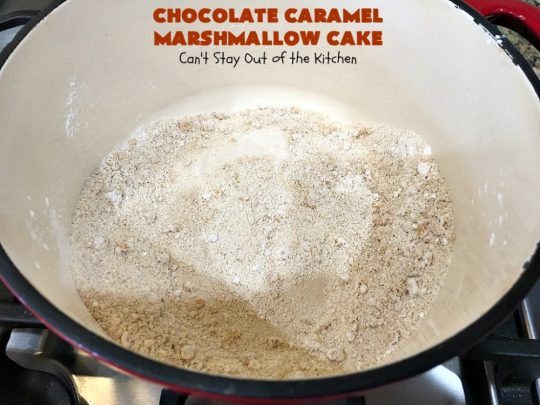 Chocolate Caramel Marshmallow Cake | this spectacular #chocolate #cake has a #caramel-like #praline filling & #marshmallow frosting. It's to die for! Terrific for company &  #holidays like #MothersDay or #FathersDay. #toffee #ChocolateCake #HolidayDessert #MothersDayDessert #FathersDayDessert #ChocolateCaramelMarshmallowCake #ChocolateDessert #CaramelDessert #ToffeeDessert #MarshmallowDessert