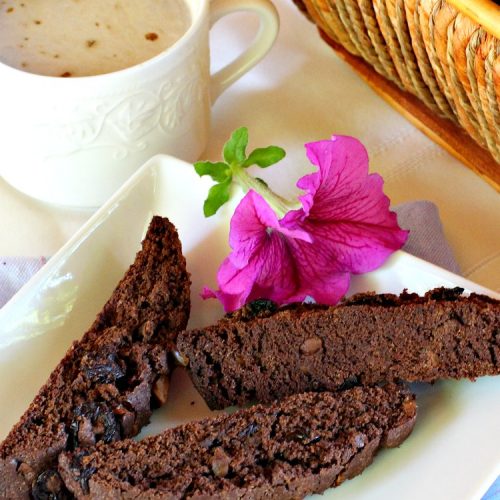 Chocolate Cherry Macadamia Biscotti | Enjoy a cup of coffee or tea with this fantastic #biscotti. It's made with dried #cherries, toasted #MacadamiaNuts & #chocolate! Excellent #breakfast idea for company or #holidays. #ChocolateCherryMacadamiaBiscotti