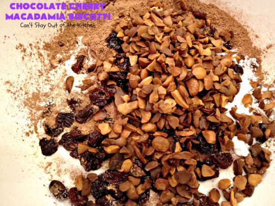 Chocolate Cherry Macadamia Biscotti | Enjoy a cup of coffee or tea with this fantastic #biscotti. It's made with dried #cherries, toasted #MacadamiaNuts & #chocolate! Excellent #breakfast idea for company or #holidays. #ChocolateCherryMacadamiaBiscotti