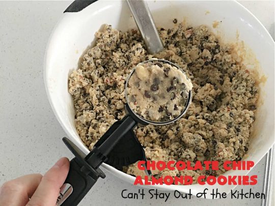 Chocolate Chip Almond Cookies | Can't Stay Out of the Kitchen | these fantastic #cookies are divine! They include 2 bags of miniature #ChocolateChips & chopped #almonds. They're crunchy, chocolaty and mammoth-sized. Wonderful for #tailgating or office parties, potlucks, soccer or hockey practice for your kids or backyard BBQs. Every bite is just perfect! #dessert #ChocolateDessert #chocolate #AlmondDessert #ChristmasCookieExchange #ChocolateChipAlmondCookies