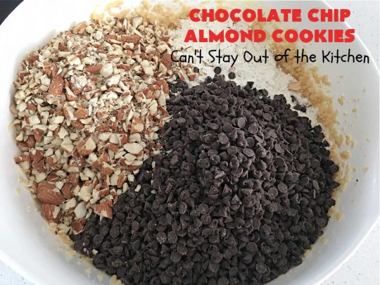 Chocolate Chip Almond Cookies | Can't Stay Out of the Kitchen | these fantastic #cookies are divine! They include 2 bags of miniature #ChocolateChips & chopped #almonds. They're crunchy, chocolaty and mammoth-sized. Wonderful for #tailgating or office parties, potlucks, soccer or hockey practice for your kids or backyard BBQs. Every bite is just perfect! #dessert #ChocolateDessert #chocolate #AlmondDessert #ChristmasCookieExchange #ChocolateChipAlmondCookies