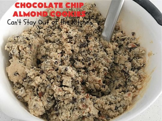Chocolate Chip Almond Cookies | Can't Stay Out of the Kitchen | these fantastic #cookies are divine! They include 2 bags of miniature #ChocolateChips & chopped #almonds. They're crunchy, chocolaty and mammoth-sized. Wonderful for #tailgating or office parties, potlucks, soccer or hockey practice for your kids or backyard BBQs. Every bite is just perfect! #dessert #ChocolateDessert #chocolate #AlmondDessert #ChristmasCookieExchange #ChocolateChipAlmondCookies