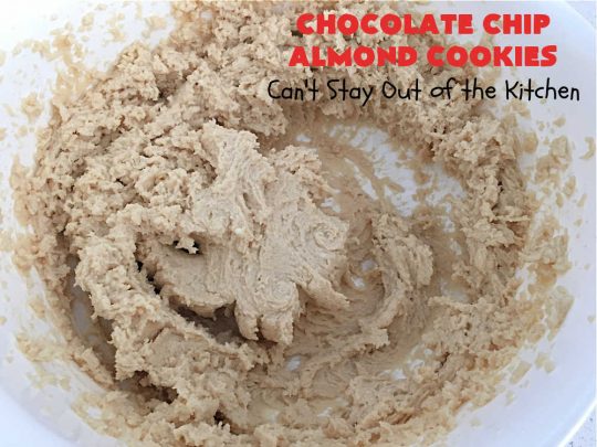Chocolate Chip Almond Cookies | Can't Stay Out of the Kitchen | these fantastic #cookies are divine! They include 2 bags of miniature #ChocolateChips & chopped #almonds. They're crunchy, chocolaty and mammoth-sized. Wonderful for #tailgating or office parties, potlucks, soccer or hockey practice for your kids or backyard BBQs. Every bite is just perfect! #dessert #ChocolateDessert #chocolate #AlmondDessert #ChristmasCookieExchange #ChocolateChipAlmondCookies