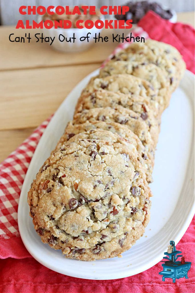 Chocolate Chip Almond Cookies | Can't Stay Out of the Kitchen | these fantastic #cookies are divine! They include 2 bags of miniature #ChocolateChips & chopped #almonds. They're crunchy, chocolaty and mammoth-sized. Wonderful for #tailgating or office parties, potlucks, soccer or hockey practice for your kids or backyard BBQs. Every bite is just perfect! #dessert #ChocolateDessert #chocolate #AlmondDessert #ChristmasCookieExchange #ChocolateChipAlmondCookies