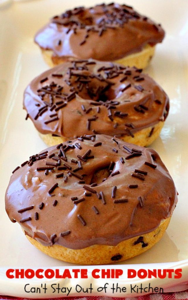 Chocolate Chip Donuts | Can't Stay Out of the Kitchen | these spectacular #donuts are filled with miniature #ChocolateChips. They're glazed with a #chocolate icing and sprinkled with chocolate #sprinkles on top. Mouthwatering #breakfast for #holidays like #MothersDay or #FathersDay. #HolidayBreakfast #FathersDayBreakfast #MothersDayBreakfast #ChocolateChipDonuts