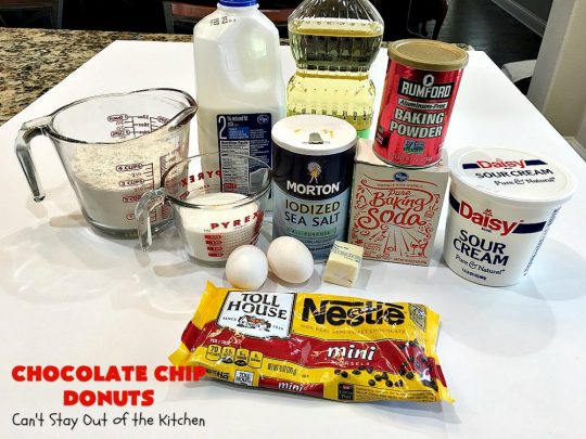 Chocolate Chip Donuts | Can't Stay Out of the Kitchen | these spectacular #donuts are filled with miniature #ChocolateChips. They're glazed with a #chocolate icing and sprinkled with chocolate #sprinkles on top. Mouthwatering #breakfast for #holidays like #MothersDay or #FathersDay. #HolidayBreakfast #FathersDayBreakfast #MothersDayBreakfast #ChocolateChipDonuts
