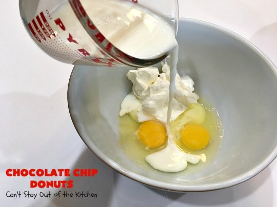Chocolate Chip Donuts | Can't Stay Out of the Kitchen | these spectacular #donuts are filled with miniature #ChocolateChips. They're glazed with a #chocolate icing and sprinkled with chocolate #sprinkles on top. Mouthwatering #breakfast for #holidays like #MothersDay or #FathersDay. #HolidayBreakfast #FathersDayBreakfast #MothersDayBreakfast #ChocolateChipDonuts