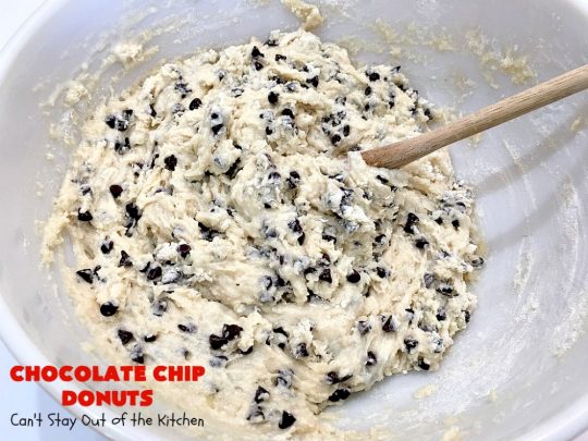 Chocolate Chip Donuts | Can't Stay Out of the Kitchen | these spectacular #donuts are filled with miniature #ChocolateChips. They're glazed with a #chocolate icing and sprinkled with chocolate #sprinkles on top. Mouthwatering #breakfast for #holidays like #MothersDay or #FathersDay. #HolidayBreakfast #FathersDayBreakfast #MothersDayBreakfast #ChocolateChipDonuts