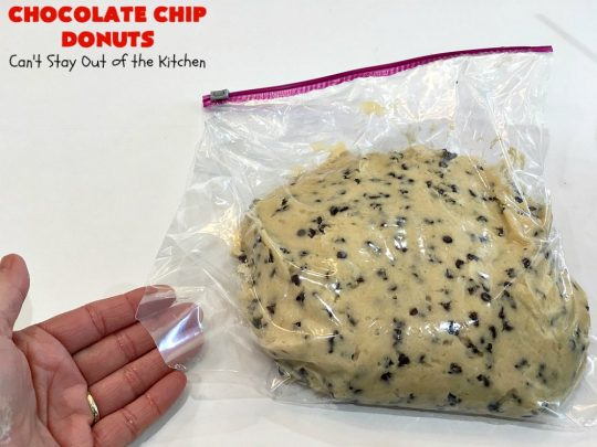 Chocolate Chip Donuts | Can't Stay Out of the Kitchen | these spectacular #donuts are filled with miniature #ChocolateChips. They're glazed with a #chocolate icing and sprinkled with chocolate #sprinkles on top. Mouthwatering #breakfast for #holidays like #MothersDay or #FathersDay. #HolidayBreakfast #FathersDayBreakfast #MothersDayBreakfast #ChocolateChipDonuts