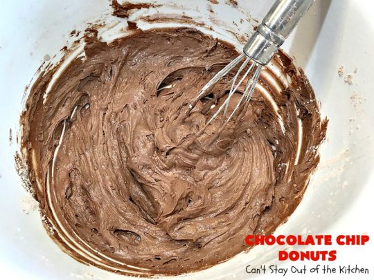 Chocolate Chip Donuts | Can't Stay Out of the Kitchen | these spectacular #donuts are filled with miniature #ChocolateChips. They're glazed with a #chocolate icing and sprinkled with chocolate #sprinkles on top. Mouthwatering #breakfast for #holidays like #MothersDay or #FathersDay. #HolidayBreakfast #FathersDayBreakfast #MothersDayBreakfast #ChocolateChipDonuts